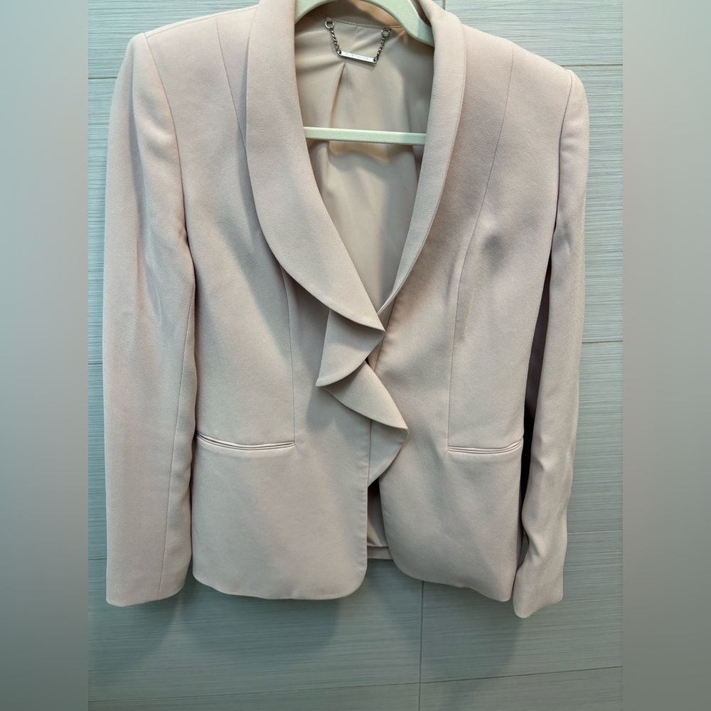 Elie Tahari pale pink blazer with a ruffle